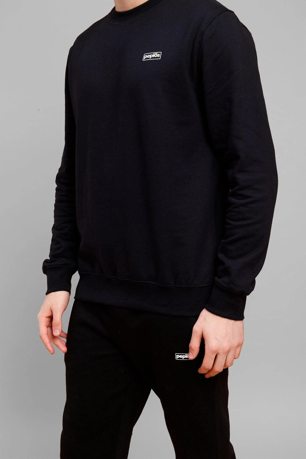 closeup view of Regular Fit Back Printed Black Sweatshirt and Sweatpants Set - Peplos Jeans 